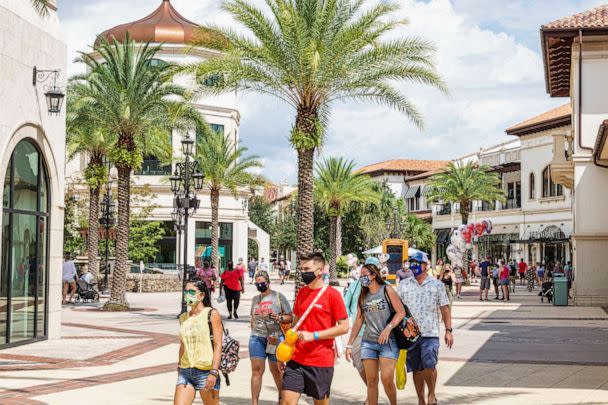 PHOTO: In this Sept. 27, 2020, file photo, people wear face masks at the Walt Disney World Resort in Orlando, Fla. (UIG via Getty Images, FILE)