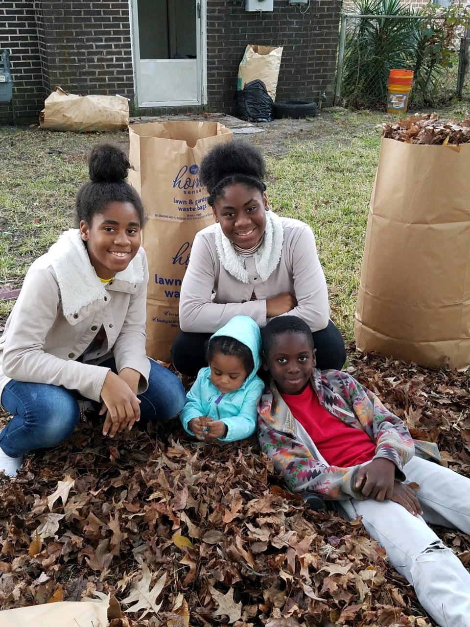 Breonna Moffett, top right, with her siblings, including Keonna, top left, her younger sister by 15 months.