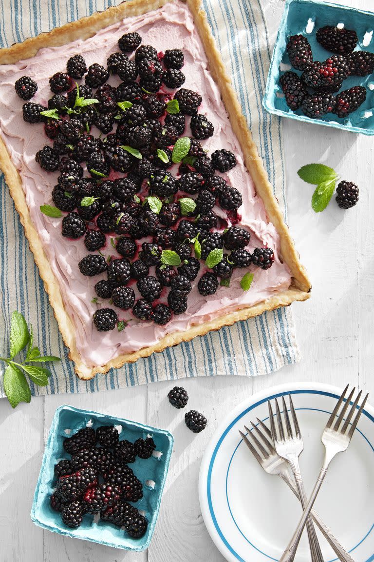 <p>Serve up this fruity tart for a bite that's both tart and sweet, thanks to the mascarpone, lime, and blackberry filling.</p><p><strong><a href="https://www.countryliving.com/food-drinks/a28609911/blackberry-tart-recipe/" rel="nofollow noopener" target="_blank" data-ylk="slk:Get the recipe for Blackberry Tart" class="link ">Get the recipe for Blackberry Tart</a>.</strong> </p>