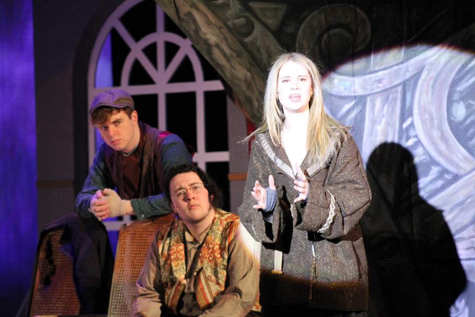 Dmitry (Nathaniel Findlay), left, and Vlad (Dillon Nashelsky) listen to Anya (Lulu Tagger) as she shares memories she can't explain in "In My Dreams," in Rye Neck's production of  "Anastasia," the musical about a girl who might or might not be royal. Performances are 7 p.m., March 2, 3; 1 and 7 p.m., March 4. $15 adults; $10 students.