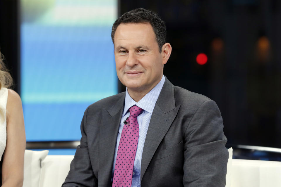 FILE - This Jan. 17, 2018, photo shows co-host Brian Kilmeade on the set of "Fox & Friends" in New York. The revelation that Fox News Channel personalities sent text messages to the White House during the Jan. 6 insurrection urging President Donald Trump to call off the attack is the latest example of the network's stars seeking to influence the actions of newsmakers instead of simply reporting the news. (AP Photo/Richard Drew, File)