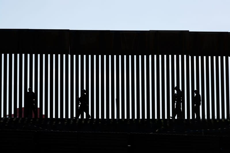 FILE PHOTO: Border Patrol agents patrol the San Ysidro border crossing after the border between Mexico and the U.S. was closed in the San Ysidro neighborhood of San Diego