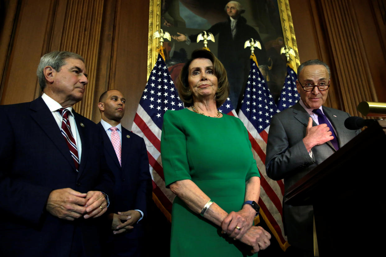 Democratic congressional leaders Nancy Pelosi and Chuck Schumer (far right) should be pleased with those numbers. (Photo: Yuri Gripas/Reuters)