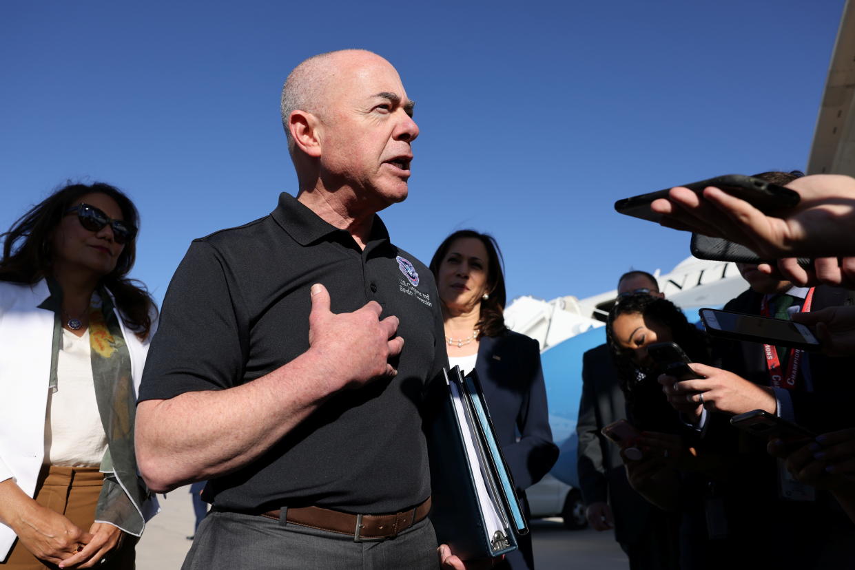 Department of Homeland Security Secretary Alejandro Mayorkas, flanked, right, by Vice President Kamala Harris and, left, by Rep. Veronica Escobar, D-Texas, talks to the media in El Paso, Texas, in June.