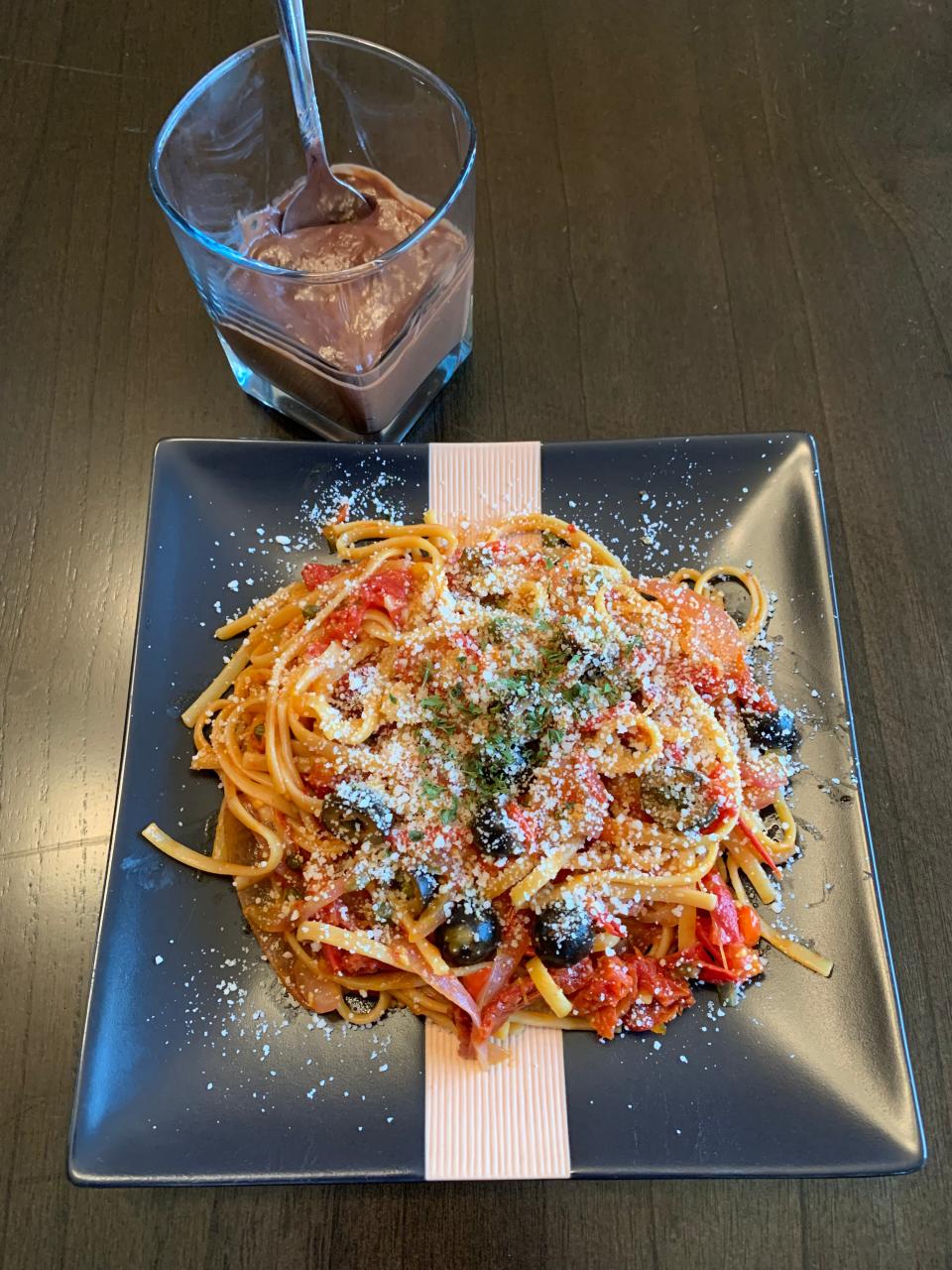 A tasty and simple vegan meal: One-Pot Spaghetti Puttanesca paired with chocolate pudding.