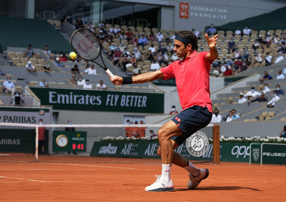 Switzerland's Roger Federer plays a return to Croatia's Marin Cilic during their second round match on day 5, of the French Open tennis tournament at Roland Garros in Paris, France, Thursday, June 3, 2021. (AP Photo/Michel Euler)