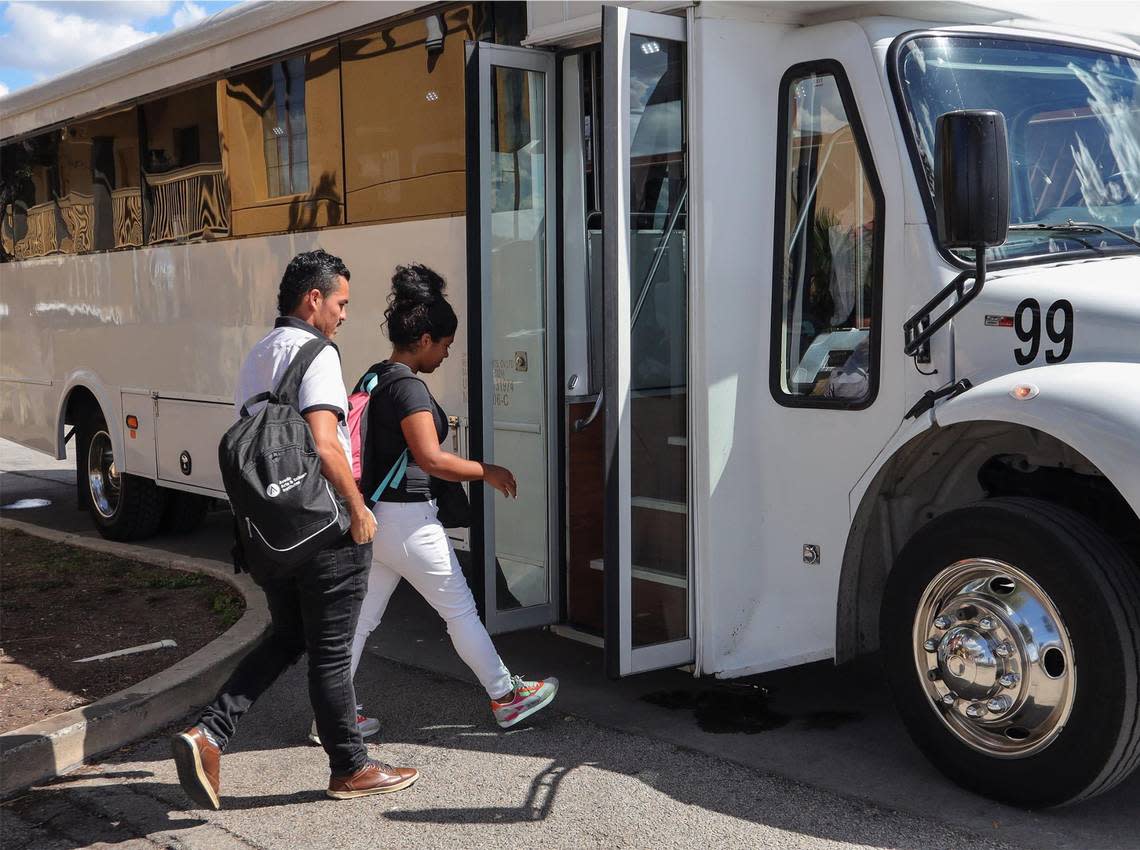 About twenty migrants (mostly men) board a charter bus back to the Migrant Resources Center after their flight to Delaware out of San Antonio, Texas was canceled on Tuesday, September 20, 2022.