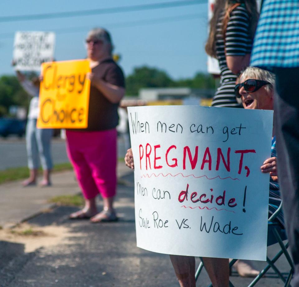 About 20 people rallied on John Sims Parkway in Niceville on Wednesday to support of Roe v. Wade in light of the recent leak of a draft of a U.S. Supreme Court ruling on abortion.