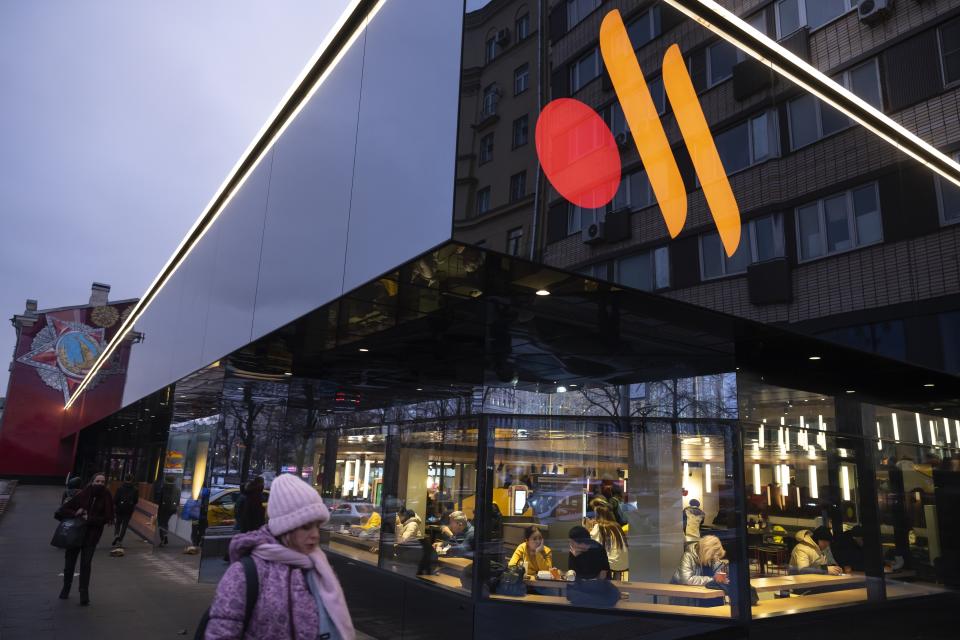 FILE - People line up to visit a newly opened restaurant in a former McDonald's outlet in Bolshaya Bronnaya Street in Moscow, Russia, Wednesday, Jan. 25, 2023. When Russia invaded Ukraine, companies were quick to respond, some announcing they would get out of Russia immediately, others vowed to curtail sales and new investment. More than a year later, it’s clear: Leaving Russia isn't as easy as the first announcements might have made it seem. (AP Photo/Alexander Zemlianichenko, File)