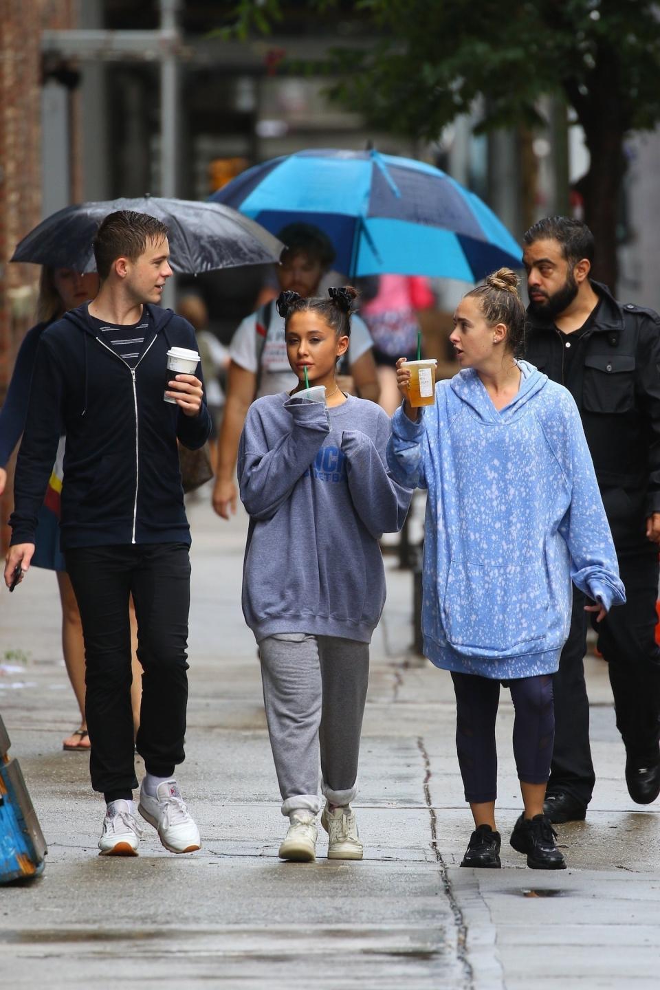 New York, NY  - Arianna Grande enjoys a stroll in the rain with her friends this afternoon in NYC after missing the Emmys last night.Pictured: Ariana GrandeBACKGRID USA 18 SEPTEMBER 2018 BYLINE MUST READ: BlayzenPhotos / BACKGRIDUSA: +1 310 798 9111 / usasales@backgrid.comUK: +44 208 344 2007 / uksales@backgrid.comUK Clients - Pictures Containing ChildrenPlease Pixelate Face Prior To Publication