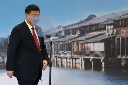 China's President Xi Jinping attends the opening ceremony of the 2nd annual World Internet Conference in Wuzhen town of Jiaxing, Zhejiang province, China, December 16, 2015. REUTERS/Aly Song