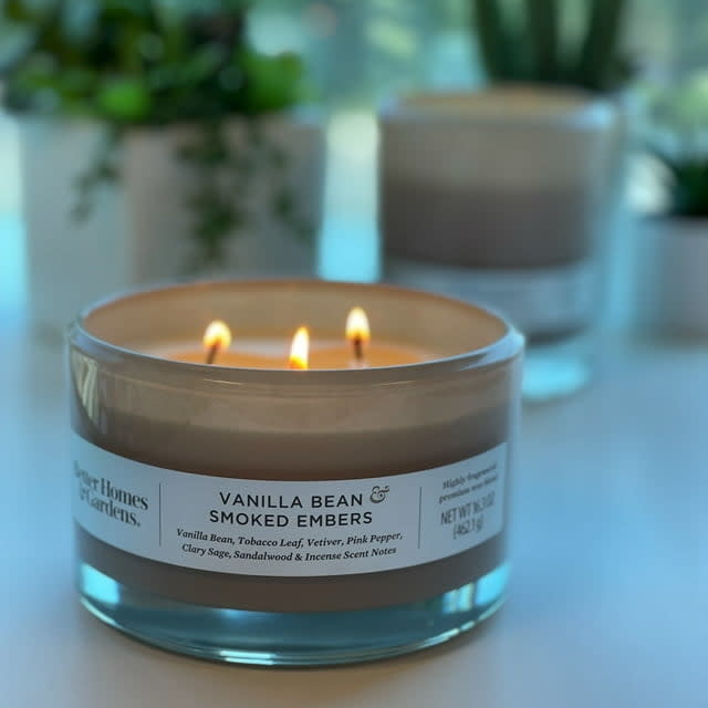 a lit vanilla bean candle