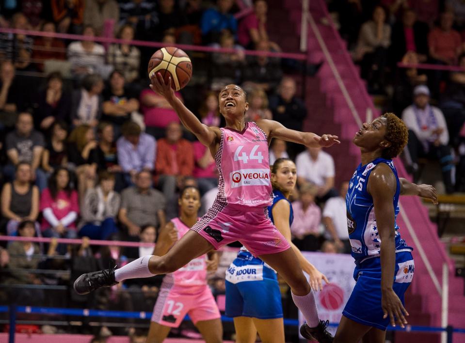 In this photo taken on Sept. 29, 2012, Arras' Dawn Evans, shoots during a basketball game in Arras, northern France. Evans, one of the nation's leading scorers for three years as a point guard at James Madison, has left her professional team in France and returned to Tennessee to prepare for a kidney transplant. (AP Photo/Pascal Bonniere, VDN)