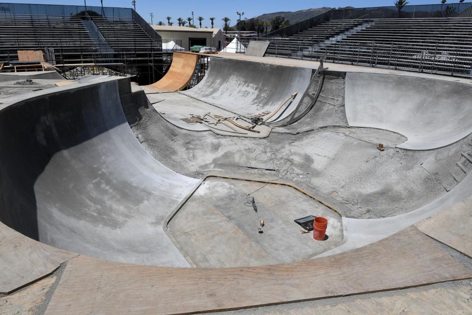 A large bowl serves as part of a skateboard and BMX course as crews transform the Ventura County Fairgrounds into the upcoming X Games finals.