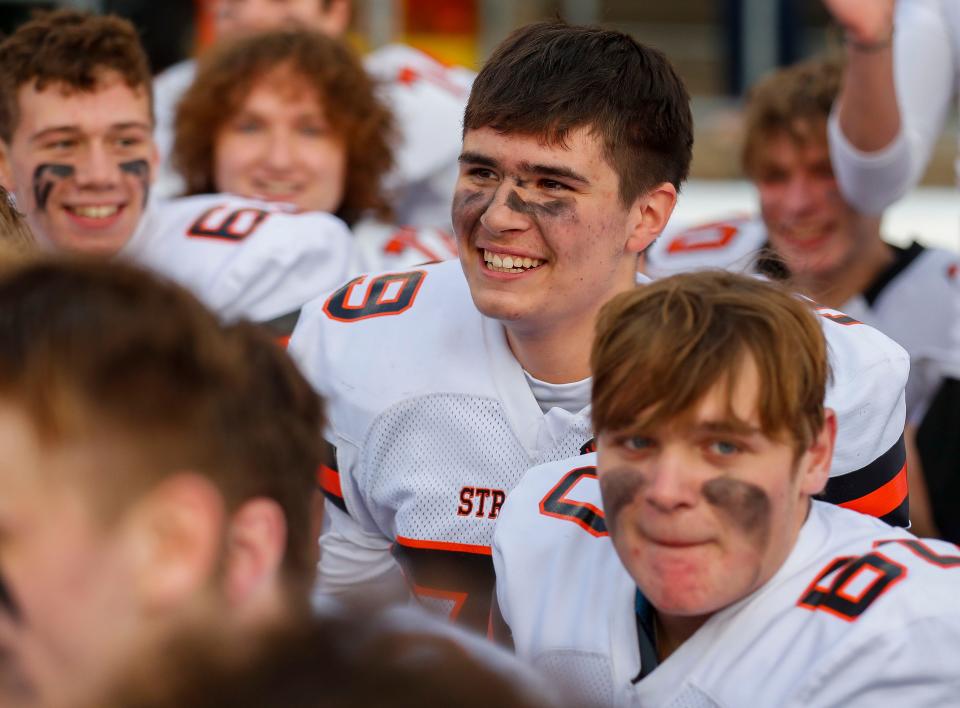 Stratford High School's Laurenz Plattner (79) smiles in the postgame huddle after defeating Darlington High Schoolduring the WIAA Division 6 state championship football game on Thursday, November 16, 2023, at Camp Randall Stadium in Madison, Wis. Stratford won the game, 10-7, as Plattner made a 32-yard field goal on the final play of the game.
Tork Mason/USA TODAY NETWORK-Wisconsin