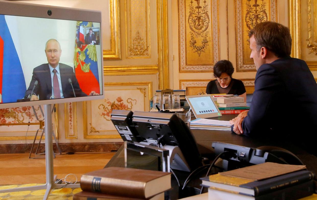 Vladimir Putin and Emmanuel Macron - Michel Euler/Pool via Reuters/File Photo