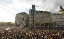 People fill the streets during a march marking the 65th anniversary of the 1956 Hungarian revolution, in Budapest, Hungary, Saturday, Oct. 23, 2021. Thousands of supporters of Prime Minister Viktor Orban, who is expected to deliver a speech marking the 65th anniversary of the 1956 Hungarian revolution, march in Budapest, Hungary to demonstrate loyalty to his right-wing government. (AP Photo/Laszlo Balogh)