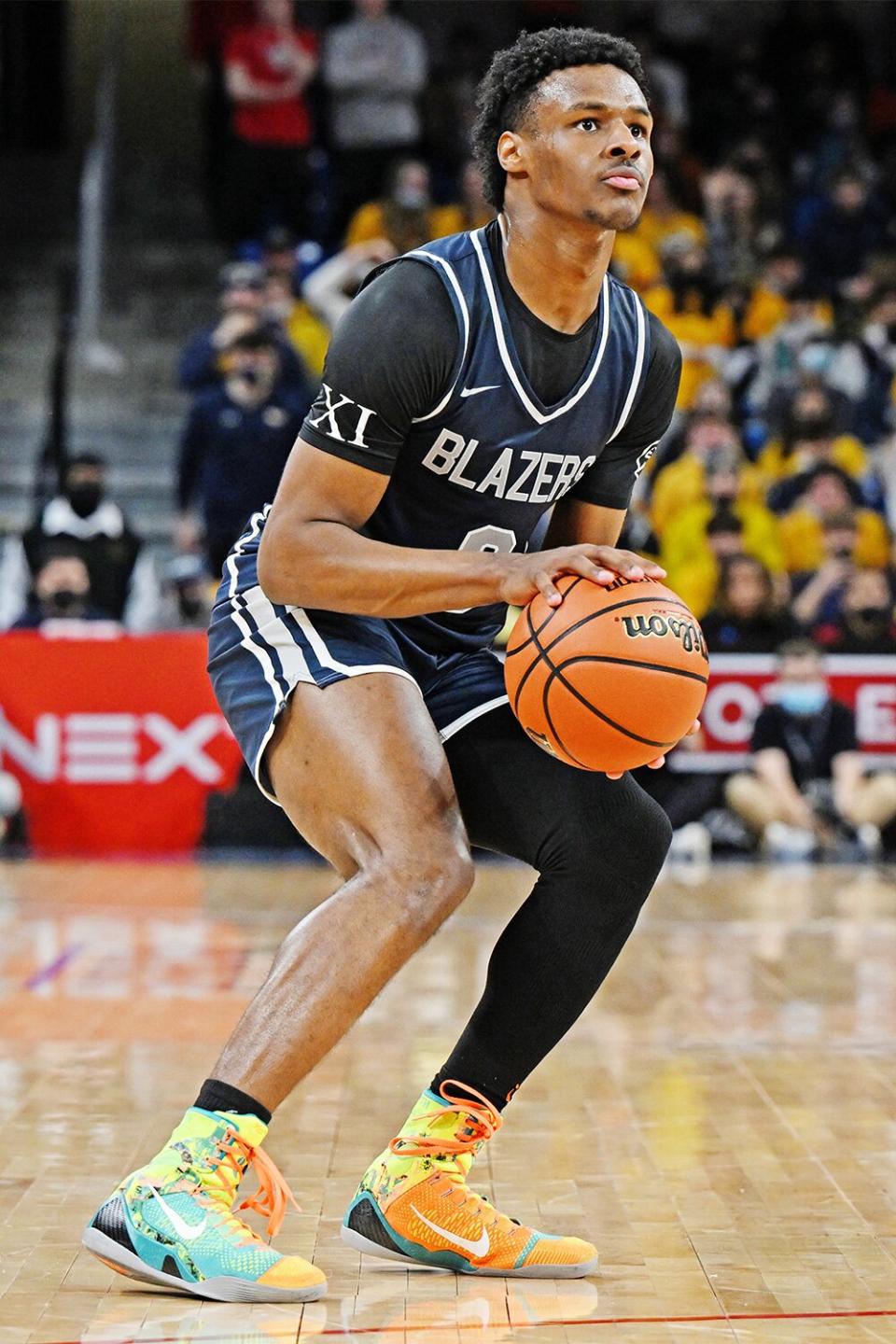 CHICAGO, ILLINOIS - FEBRUARY 05: Bronny James #0 of Sierra Canyon (CA) shoots a three-point basket in the first half against Glenbard West (IL) at Wintrust Arena on February 5, 2022 in Chicago, Illinois. (Photo by Quinn Harris/Getty Images)