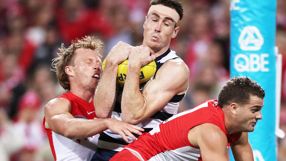 Jeremy Cameron, pictured here being denied a mark that could have given Geelong victory over the Swans.