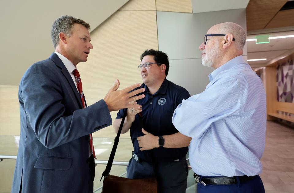 Rep. Blake Moore, R-Utah, speaks with Rep. Ryan Wilcox, R-Ogden, and Steve Handy, former state representative and current Department of Alcoholic Beverage Services commissioner, after Sutherland Institute’s 2023 Congressional Series at the Olene S. Walker Institute of Politics and Public Service at Weber State University in Ogden on Tuesday, Aug. 29, 2023. | Kristin Murphy, Deseret News