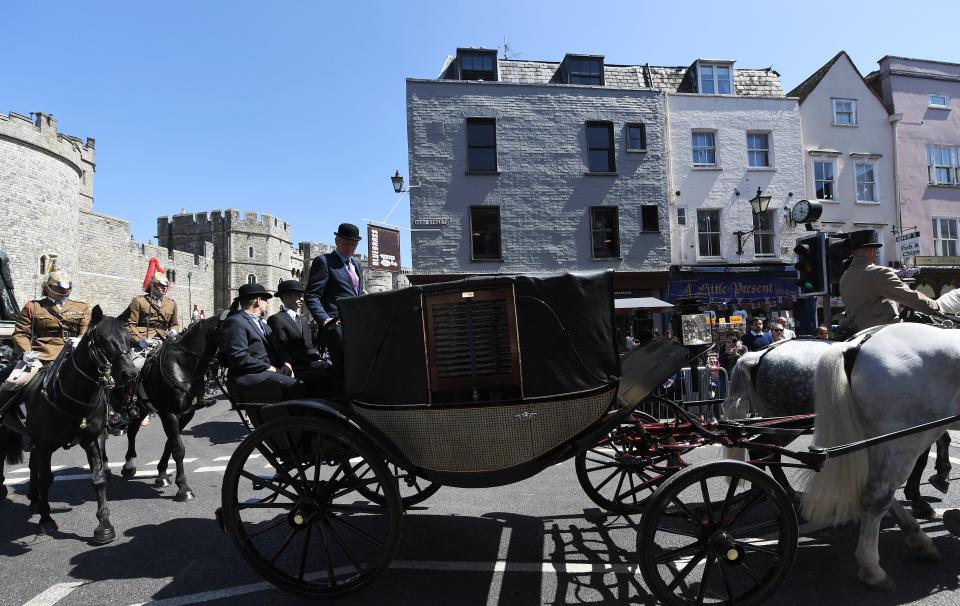 Public have been asked not to throw confetti when the newlyweds parade through Windsor in an open carriage, seen here during rehearsals (Rex)