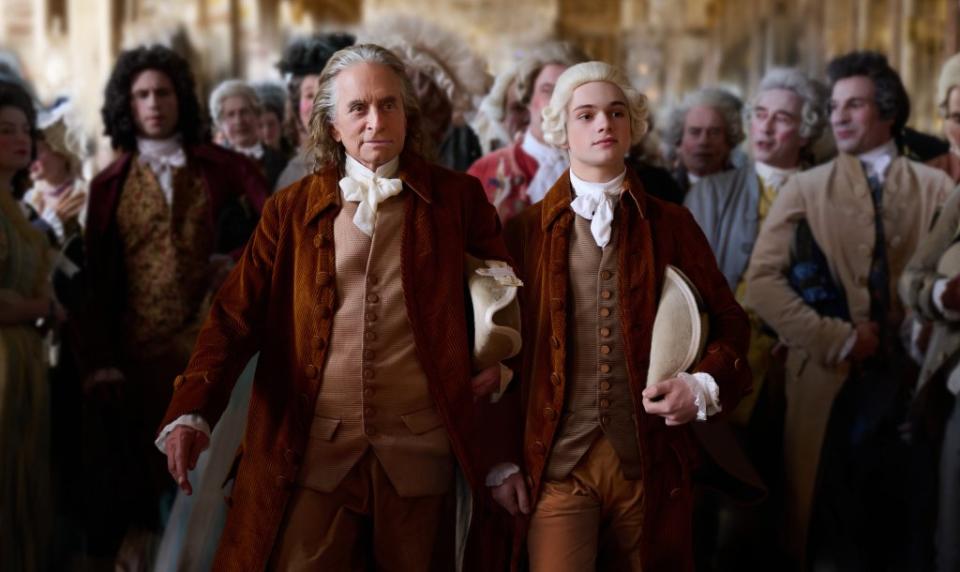 Courtin’: Michael Douglas and Noah Jupe as Ben Franklin and his grandson, Temple, in “Franklin” on Apple TV+. Courtesy of Apple