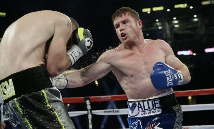 Canelo Alvarez pressured Liam Smith early and often on Saturday. (AP)