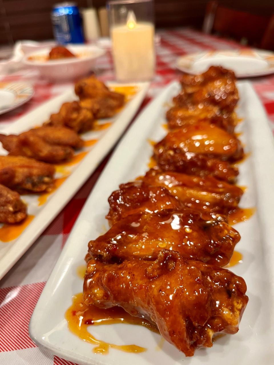 The wings at Matthew's Pizza Kitchen come in a variety of flavors, including pineapple teriyaki, bbq honey, sweet chili and boom boom sauce.