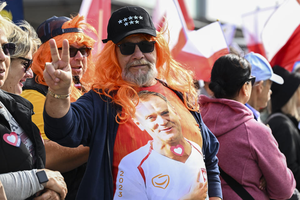 A protestor wears a shirt showing opposition leader Donald Tusk during a march to support the opposition against the governing populist Law and Justice party in Warsaw, Poland, Sunday, Oct. 1, 2023. Polish opposition leader Donald Tusk seeks to boost his election chances for the parliament elections on Oct. 15, 2023, leading the rally in the Polish capital. (AP Photo/Rafal Oleksiewicz)