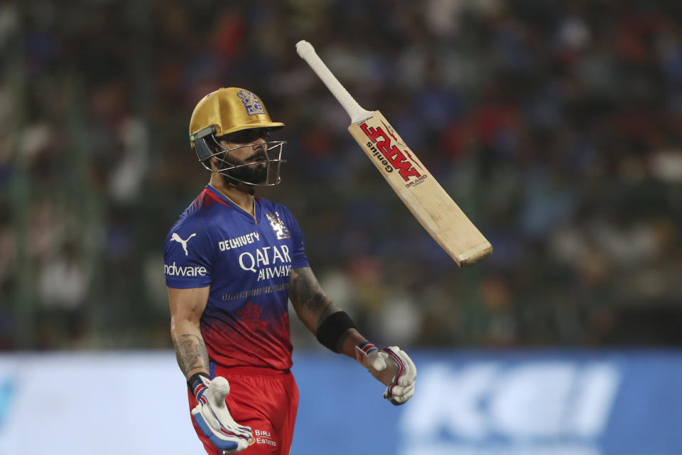 Royal Challengers Bengaluru's Virat Kohli walks off the field after losing his wicket during the Indian Premier League cricket match between Royal Challengers Bengaluru and Gujarat Titans in Bengaluru, India, Saturday, May 4, 2024. (AP Photo)