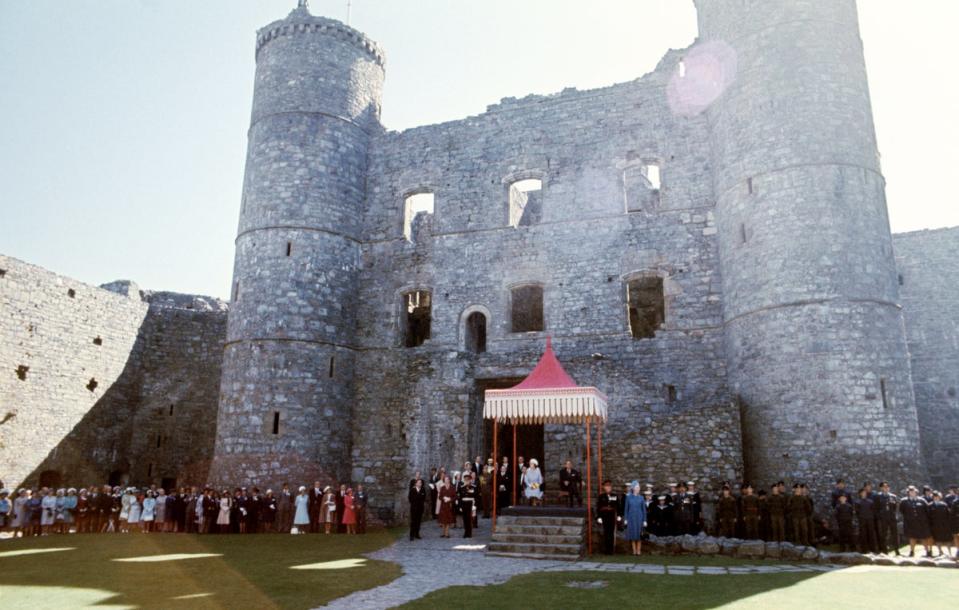 Queen Elizabeth and the Duke of Edinburgh at Harlech Castle, Glyndwr’s former stronghold, during the Silver Jubilee celebrations (PA) (PA Archive)