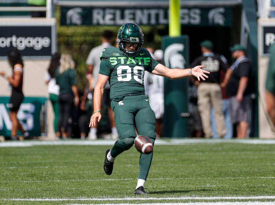 Michigan State punter Bryce Baringer (99) warms up before the Akron game at Spartan Stadium in East Lansing on Saturday, Sept. 10, 2022.