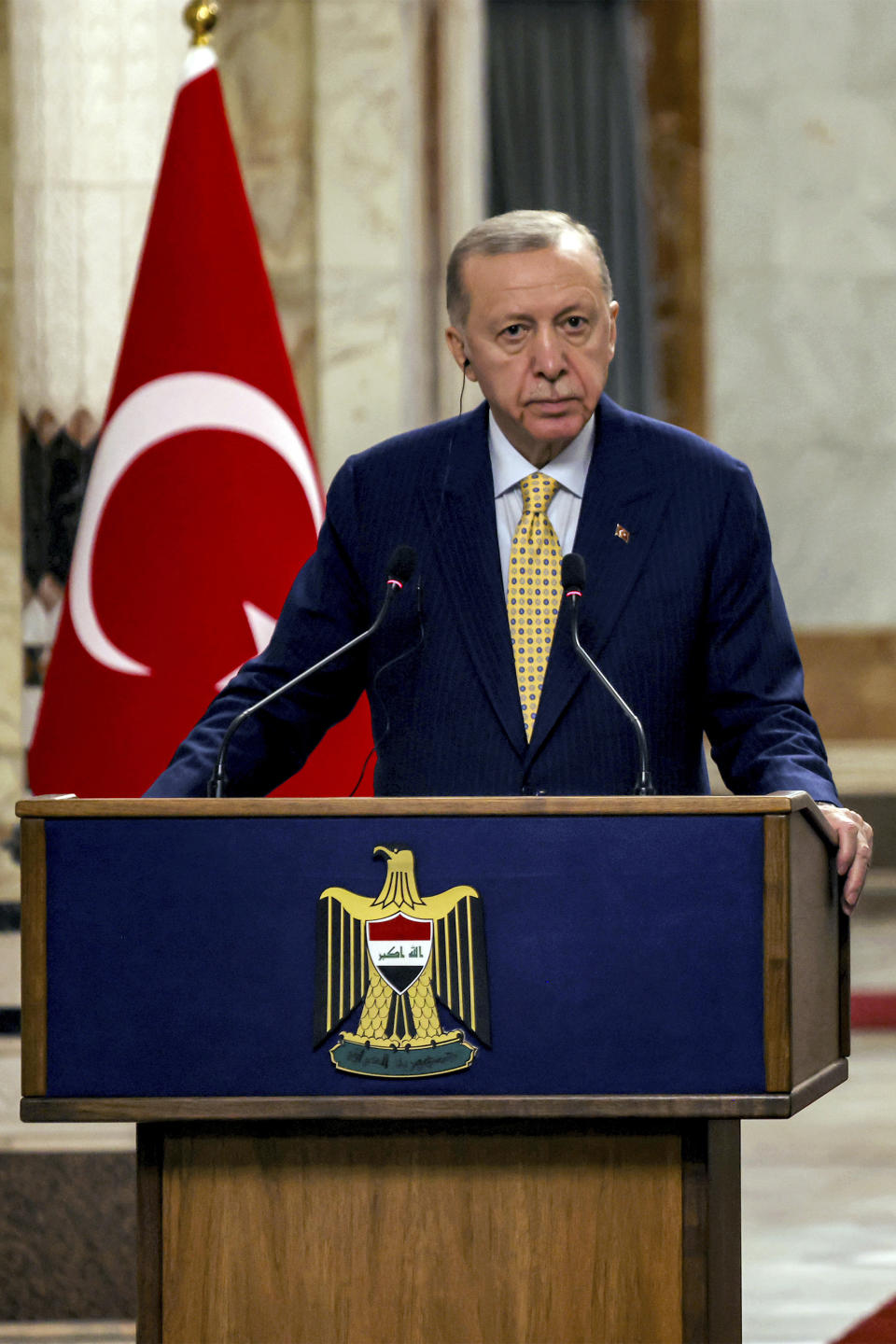 Turkish President Recep Tayyip Erdogan speaks during a joint statement to the media in Baghdad, Iraq, Monday, April 22, 2024. Erdogan arrived in Iraq on Monday for his first official visit in more than a decade. (Ahmad Al-Rubaye /Pool Photo via AP)