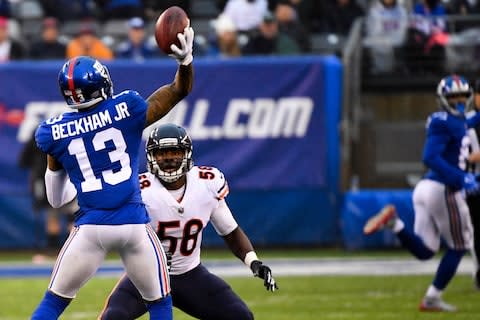 New York Giants wide receiver Odell Beckham Jr. (13) throws a touchdown pass to New York Giants wide receiver Russell Shepard (81) in the third quarter against the Bears at MetLife Stadium - Credit: Robert Deutsch/USA TODAY