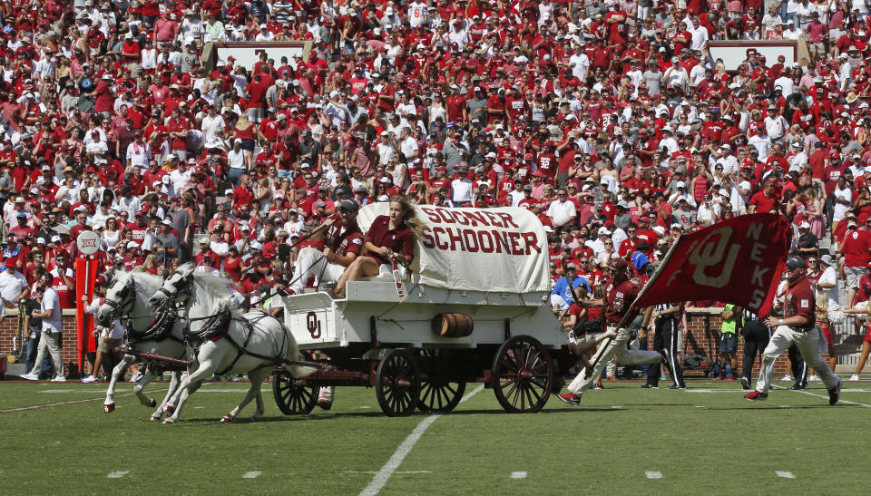 The Sooner Schooner is driven onto the field following a touchdown in the first half of an NCAA college football game against Florida Atlantic in Norman, Okla., Saturday, Sept. 1, 2018. (AP Photo/Sue Ogrocki)