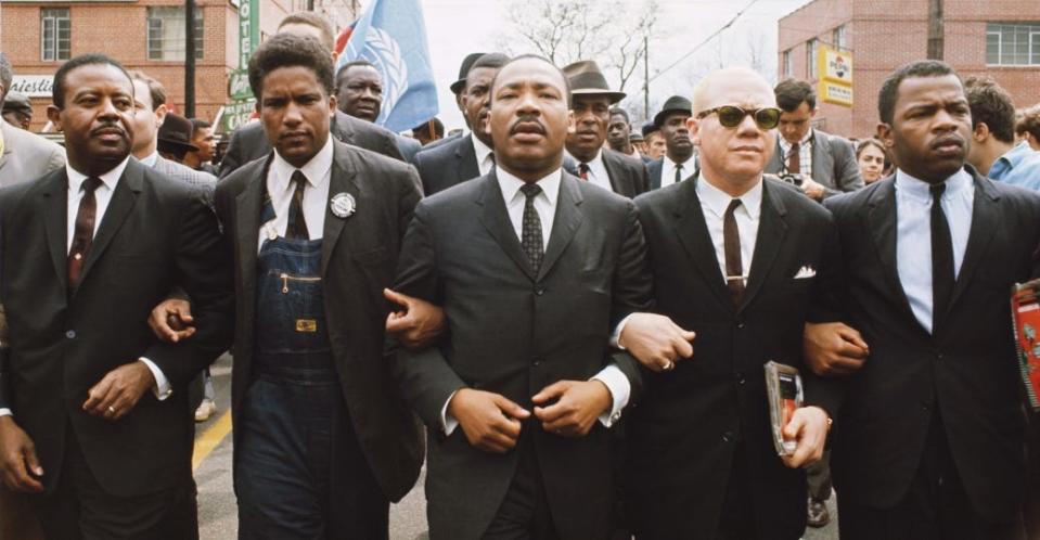 The Rev. Martin Luther King Jr. marches on South Jackson Street in Montgomery.