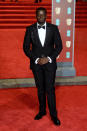 <p>The Oscar-nominated actor was dapper in a black tux. <em>[Photo: Getty]</em> </p>