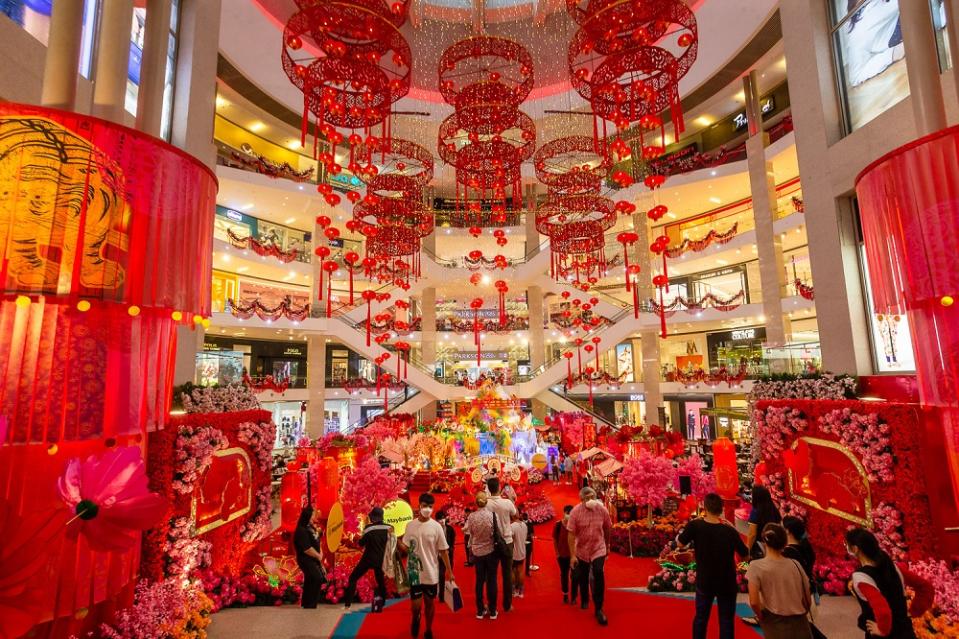 Pavilion KL does not disappoint with its vibrant decoration and a Paper Art Garden in the centre featuring the five elemental tigers. — Picture by Devan Manuel