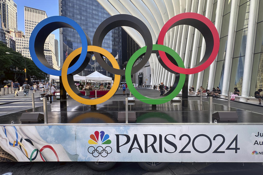 Olympic rings are displayed in New York City on Tuesday, July 9, 2024, ahead of the Summer Olympics in Paris. The five interlocking rings — blue, yellow, black, green and red — symbolize five regions of the world involved in the Olympic movement — Europe, Asia, Africa, the Americas and Oceania. (AP Photo/Ted Shaffrey)