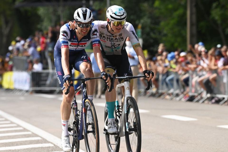 Bahrain  Victorious Slovenian rider Matej Mohoric R celebrates next to Soudal QuickSteps Danish rider Kasper Asgreen C in the finish area after winning the 19th stage of the 110th edition of the Tour de France cycling race 173 km between MoiransenMontagne and Poligny in the Jura department of centraleastern France on July 21 2023 Photo by Tim De Waele  POOL  AFP Photo by TIM DE WAELEPOOLAFP via Getty Images