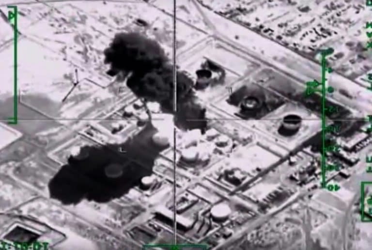 A video image of a Russian air strike on an Islamic State group oil-processing facility at an unidentified location in Syria