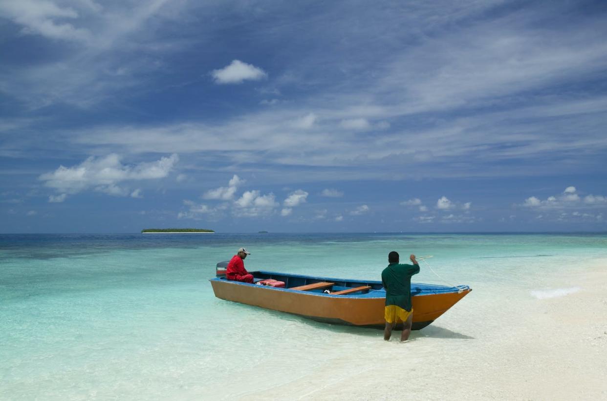 Debt swaps in some countries have involved commitments to protect the ocean. <a href="https://www.gettyimages.com/detail/news-photo/funafuti-atoll-is-at-the-front-line-against-global-warming-news-photo/543723360" rel="nofollow noopener" target="_blank" data-ylk="slk:Ashley Cooper/Corbis via Getty Images;elm:context_link;itc:0;sec:content-canvas" class="link ">Ashley Cooper/Corbis via Getty Images</a>