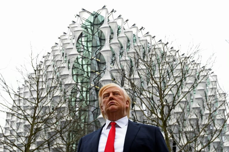 A wax figure of US President Donald Trump stands outside the new US Embassy in London