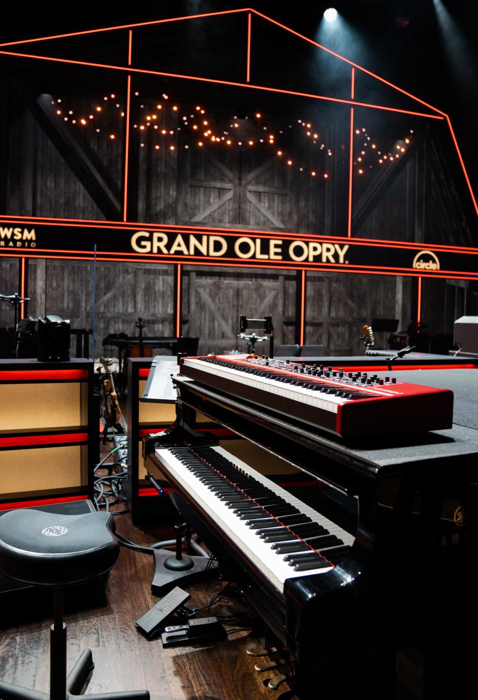 A piano and keys sit on the new Grand Ole Opry stage before the start of performances on Feb 4, 2023; Nashville, TN, USA;  Mandatory Credit: Sarah White-The Tennessean