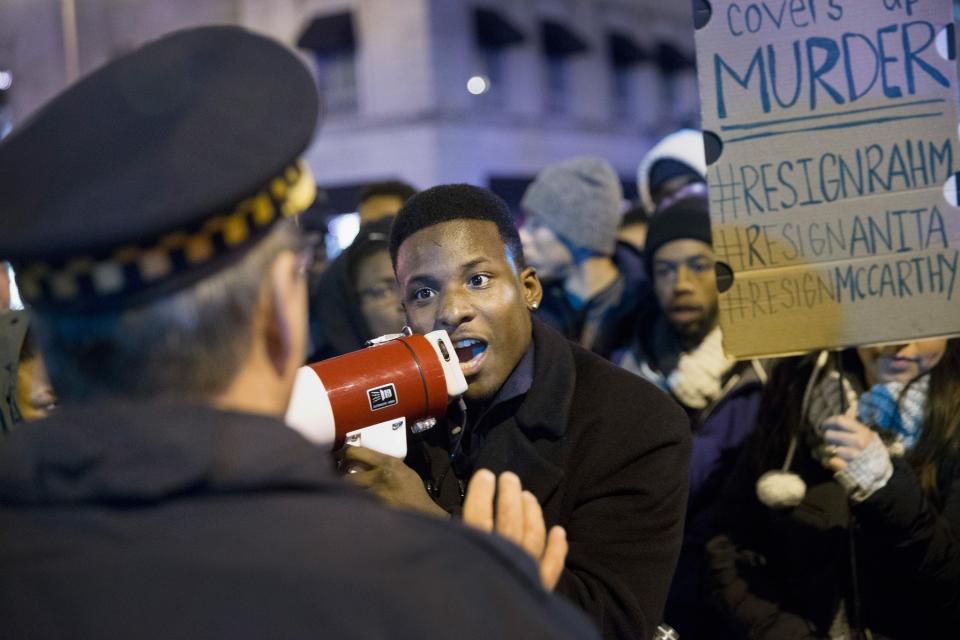 Demonstrators confront police during a protest over the death of Laquan McDonald on November 25, 2015 in Chicago, Illinois. (Photo: Scott Olson/Getty Images)
