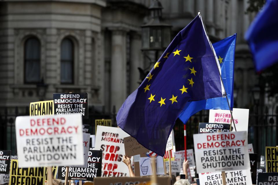 Anti Brexit protesters demonstrate during a rally outside Downing Street in London, Saturday, Aug. 31, 2019. Political opposition to Prime Minister Boris Johnson's move to suspend Parliament is crystalizing, with protests around Britain and a petition to block the move gaining more than 1 million signatures. (AP Photo/Alastair Grant)