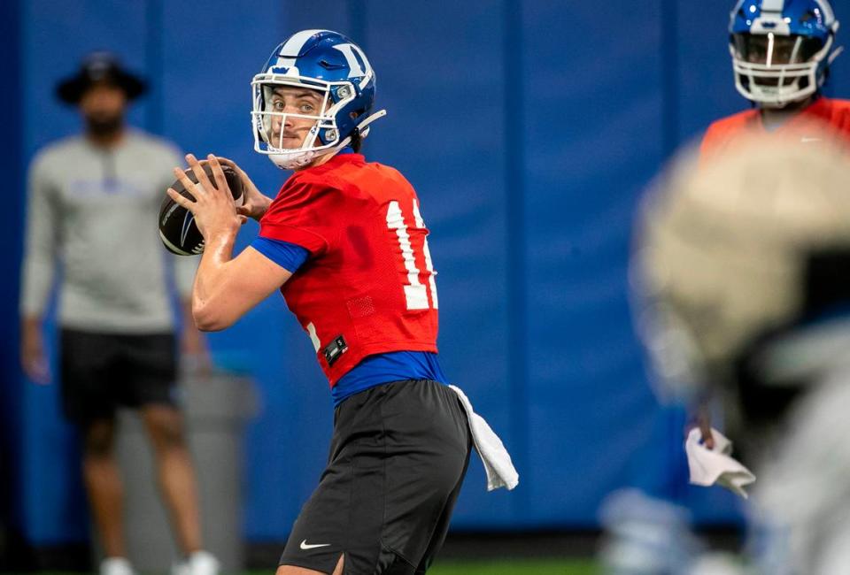 Duke quarterback Grayson Loftis (12) looks for a receiver during the Blue Devils’ spring practice on Friday, March 24, 2023 in Durham, N.C.