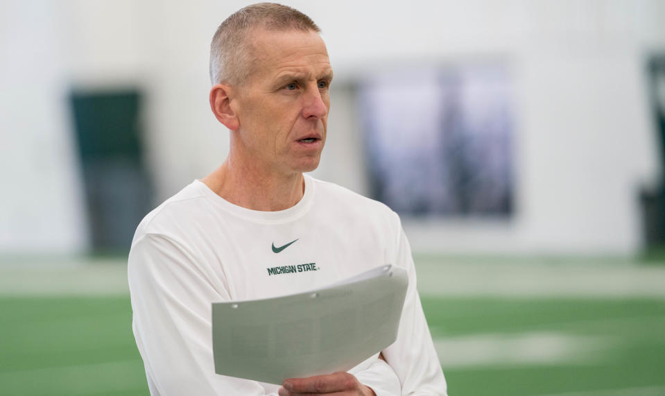 Michigan State offensive coordinator Jay Johnson, a former analyst at Georgia, observes a March workout.