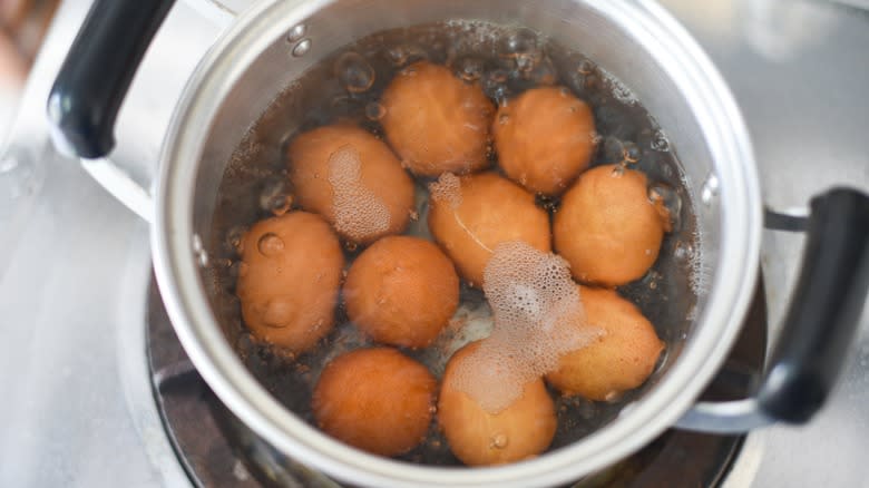 eggs boiling in a pot