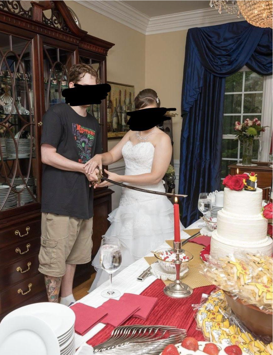 A groom wearing cargo shorts and a T-shirt